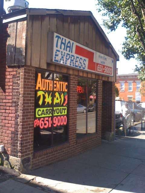 The Thai Express storefront on West McMillan with its Authentic Thai Carryout sign